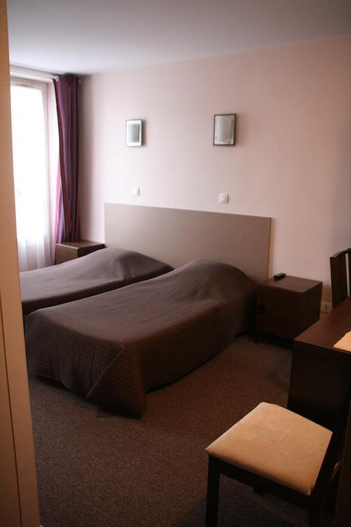 Hotel Du Roussillon Παρίσι Δωμάτιο φωτογραφία
